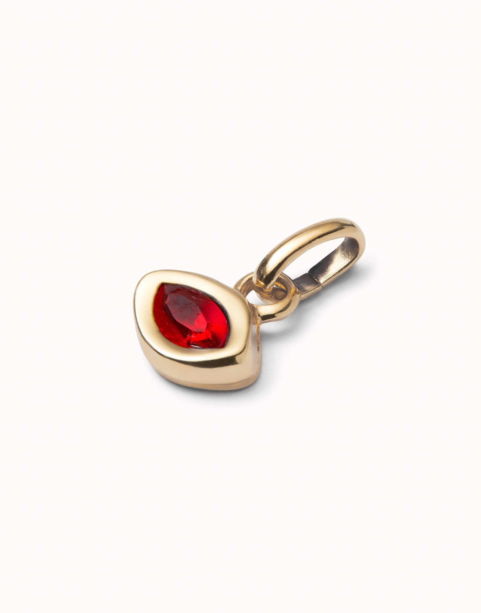 Charm with red crystal