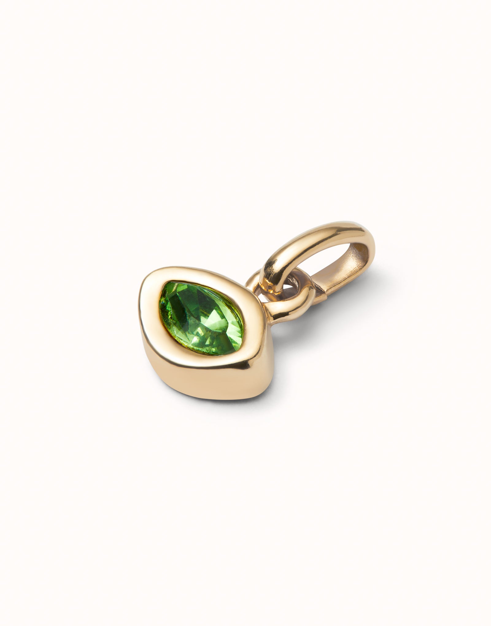 Charm with green crystal