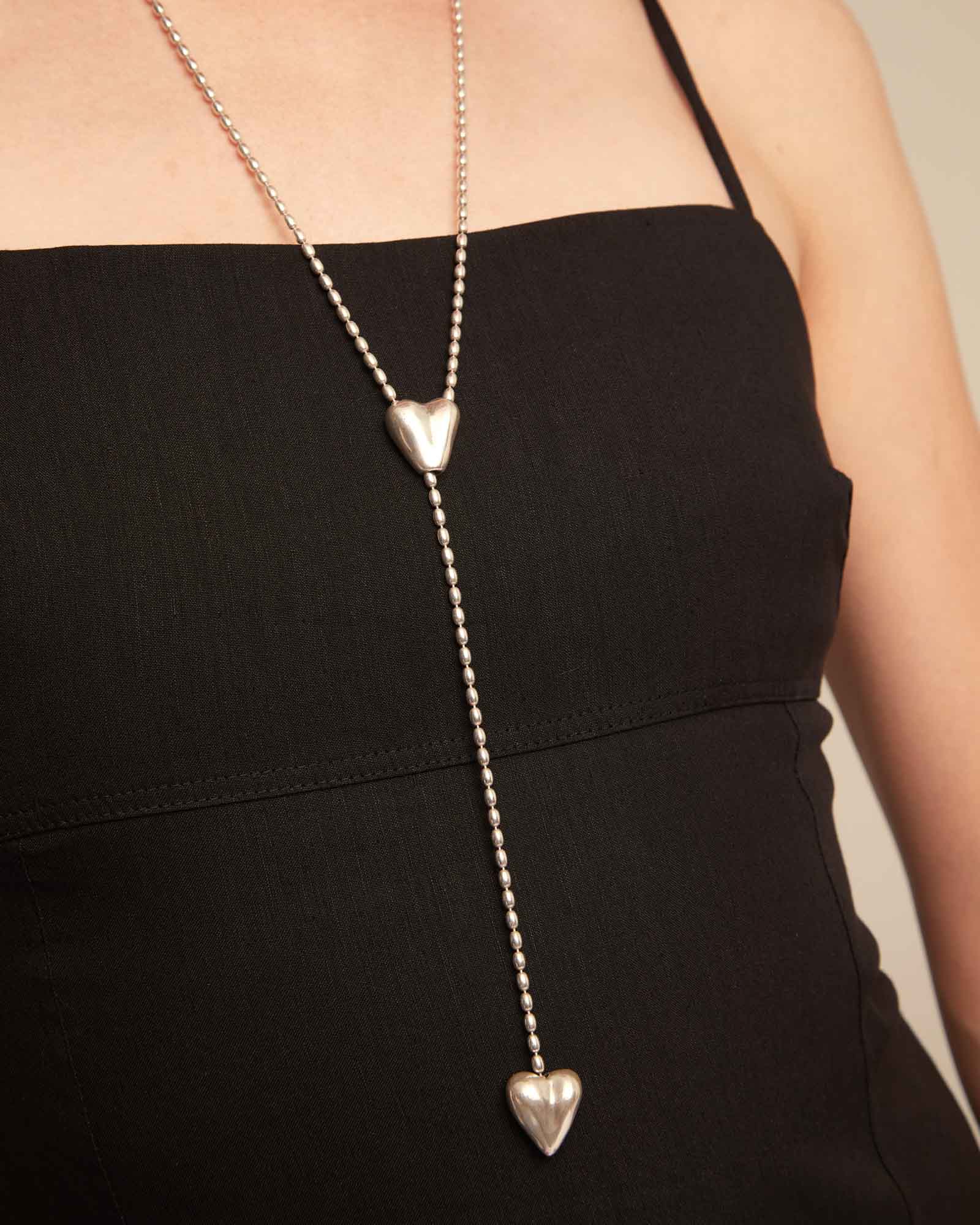 Long adjustable chain necklace with two hearts