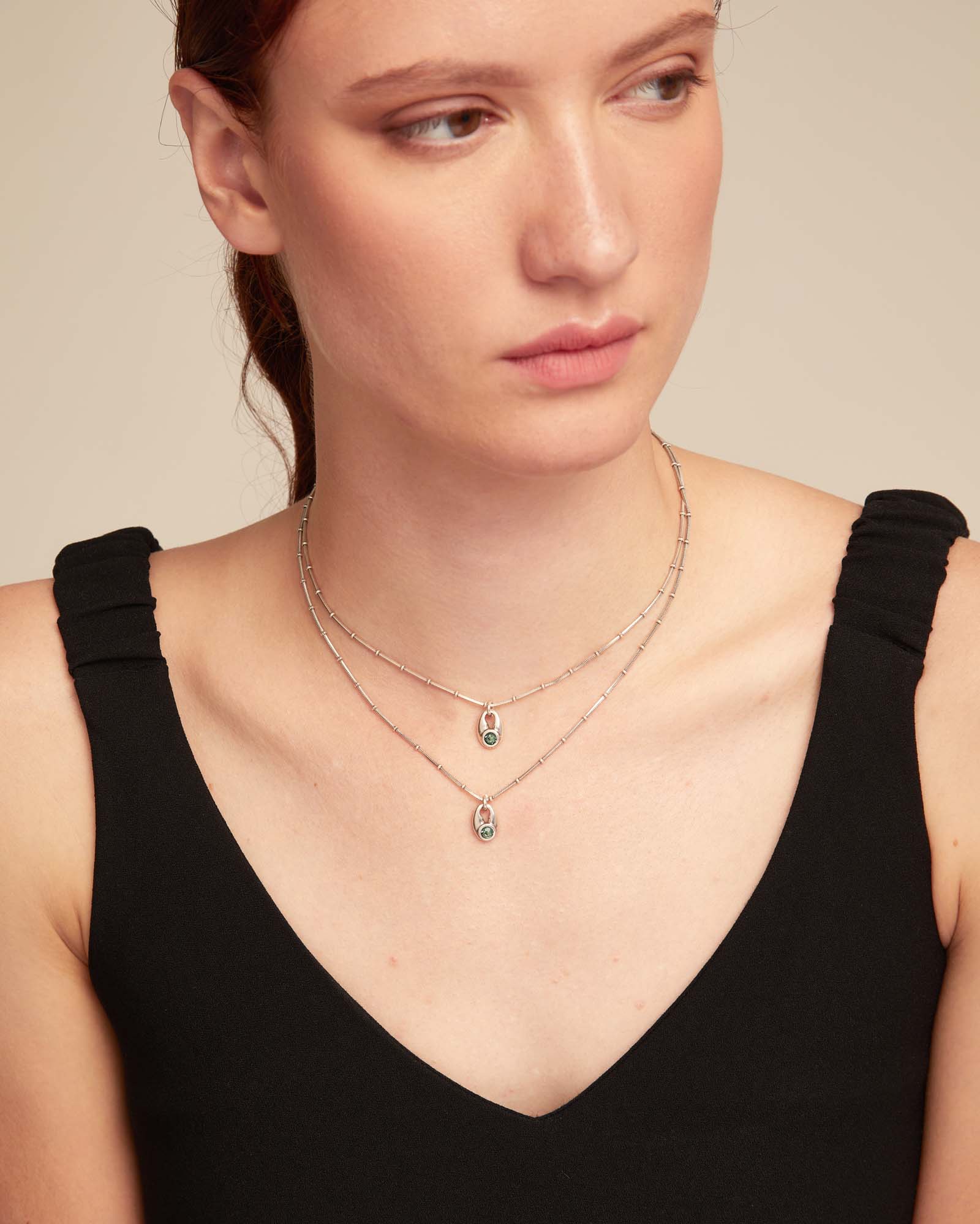 Multi strand chain necklace with blue crystals