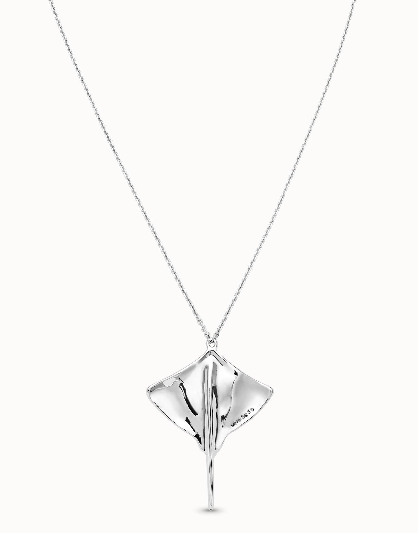Long chain pendant necklace with manta ray