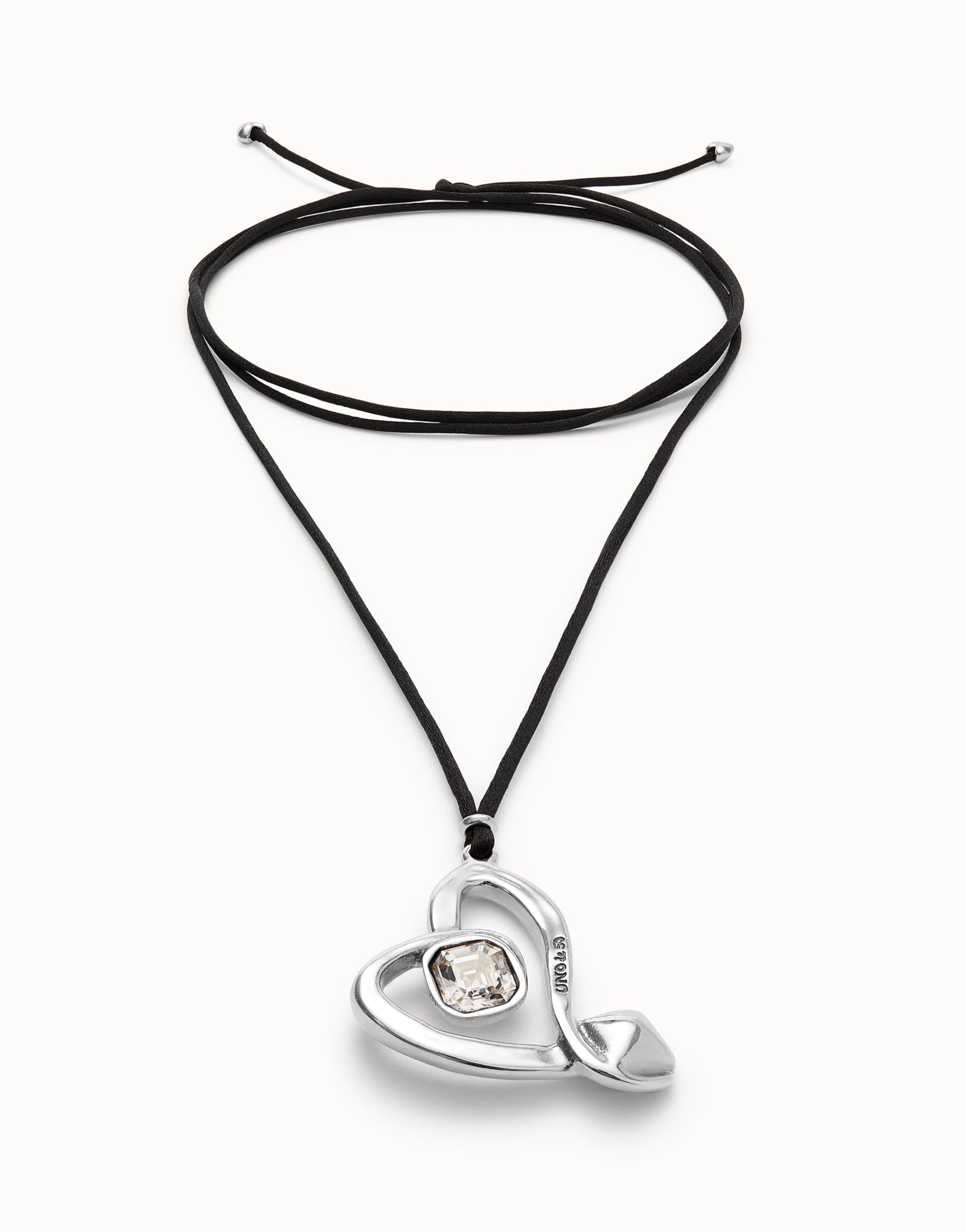 Long pendant and central heart with transparent crystal