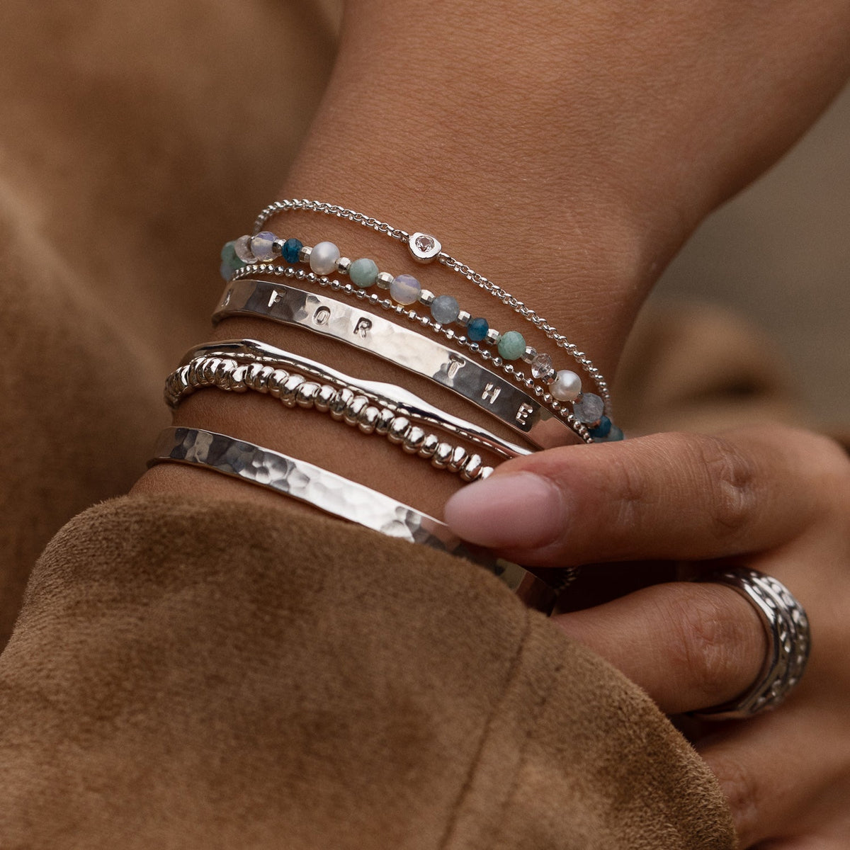 ‘Life Luck Love Laughter’ Hand-Stamped Hammered Nomad Bangle