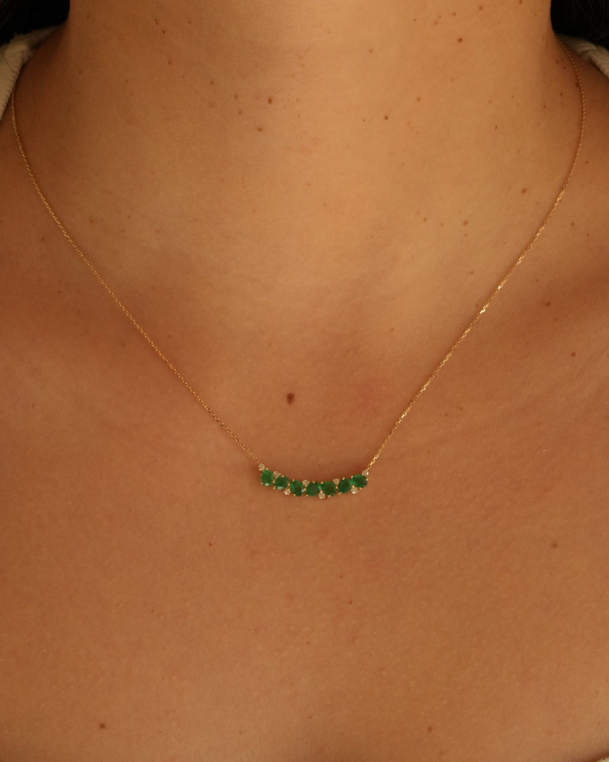 Gold Diamond and Emerald Curved Bar Necklace