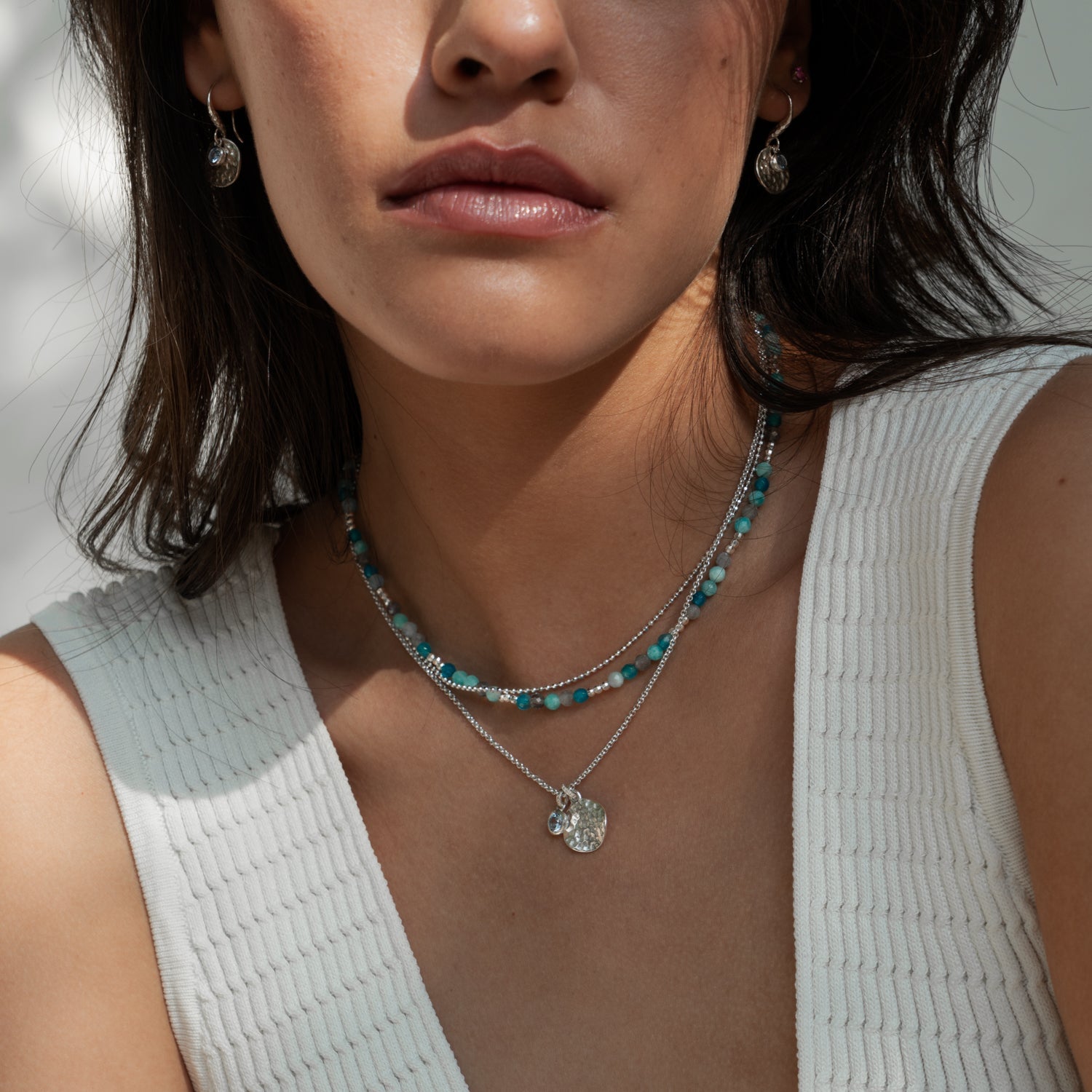 Hammered Disc & 5mm Blue Topaz Array Pendant