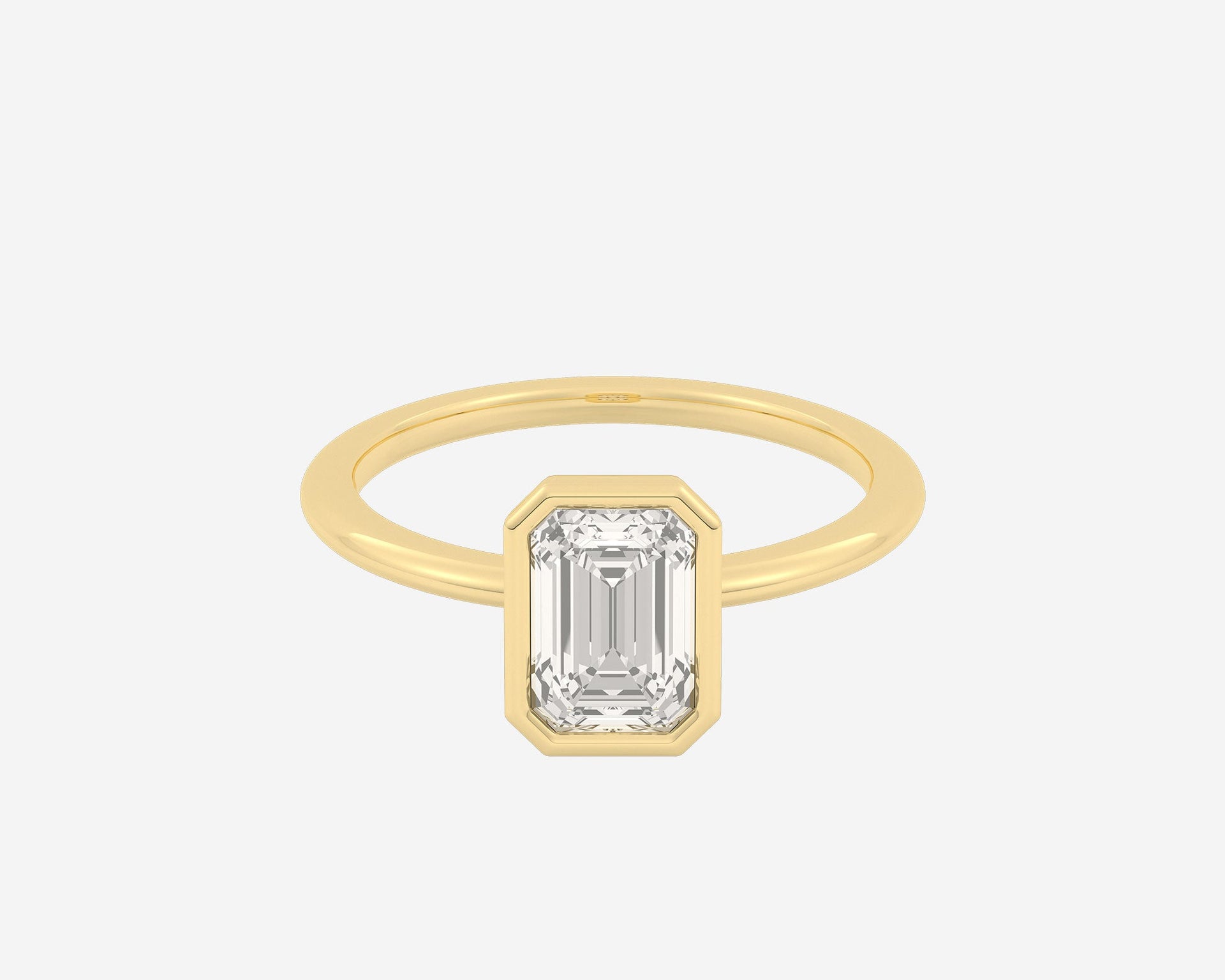 The Low Set Bezel Solitaire — Emerald