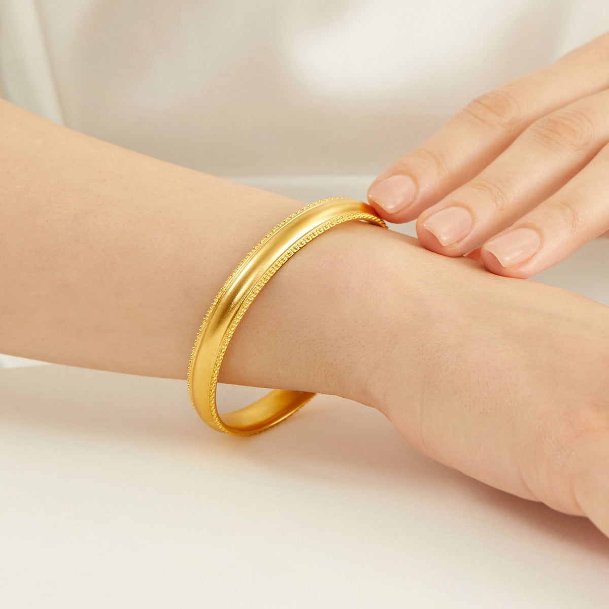 The Oriental' 999.9 Gold Bangle