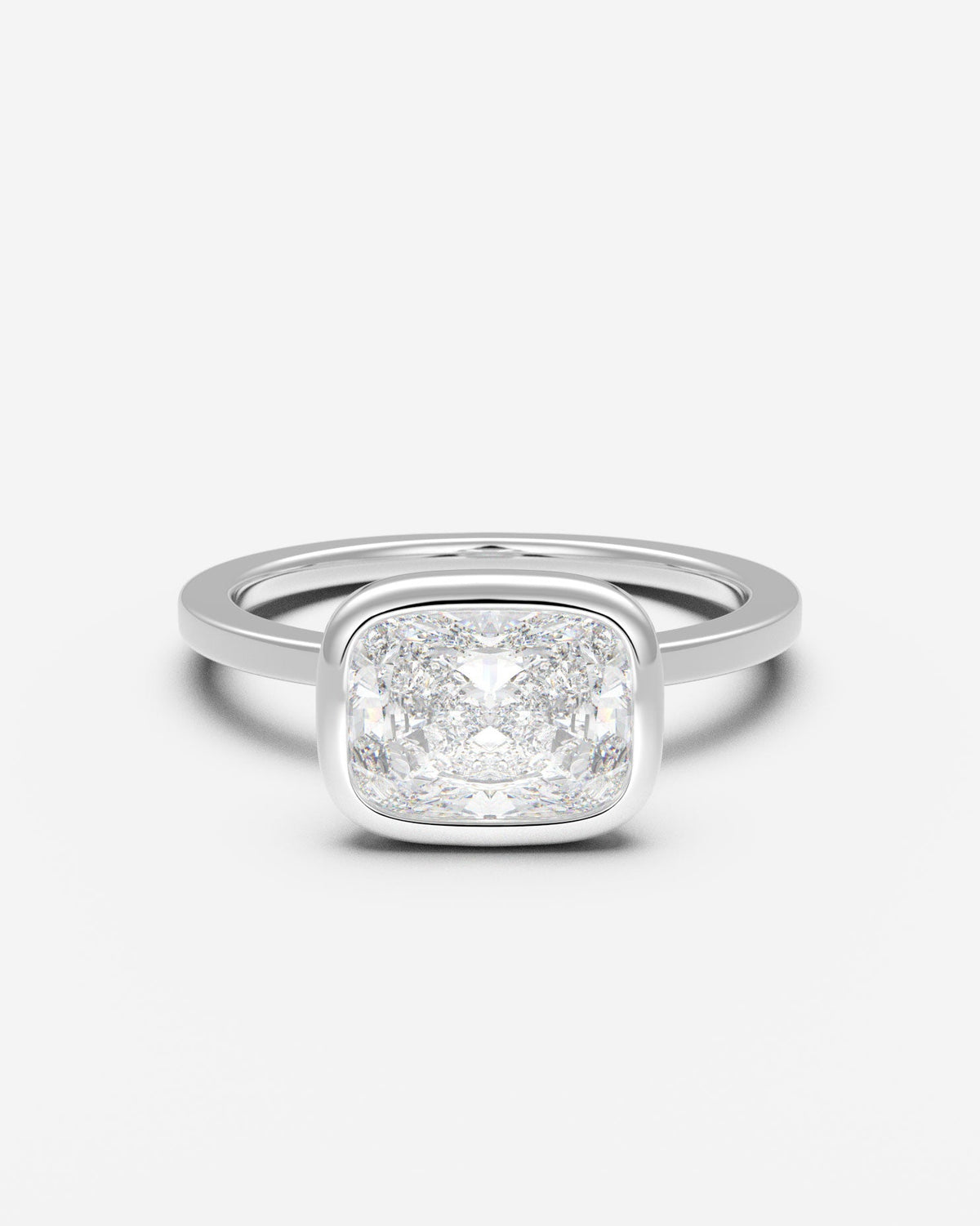 The East West Bezel Solitaire — Elongated Cushion