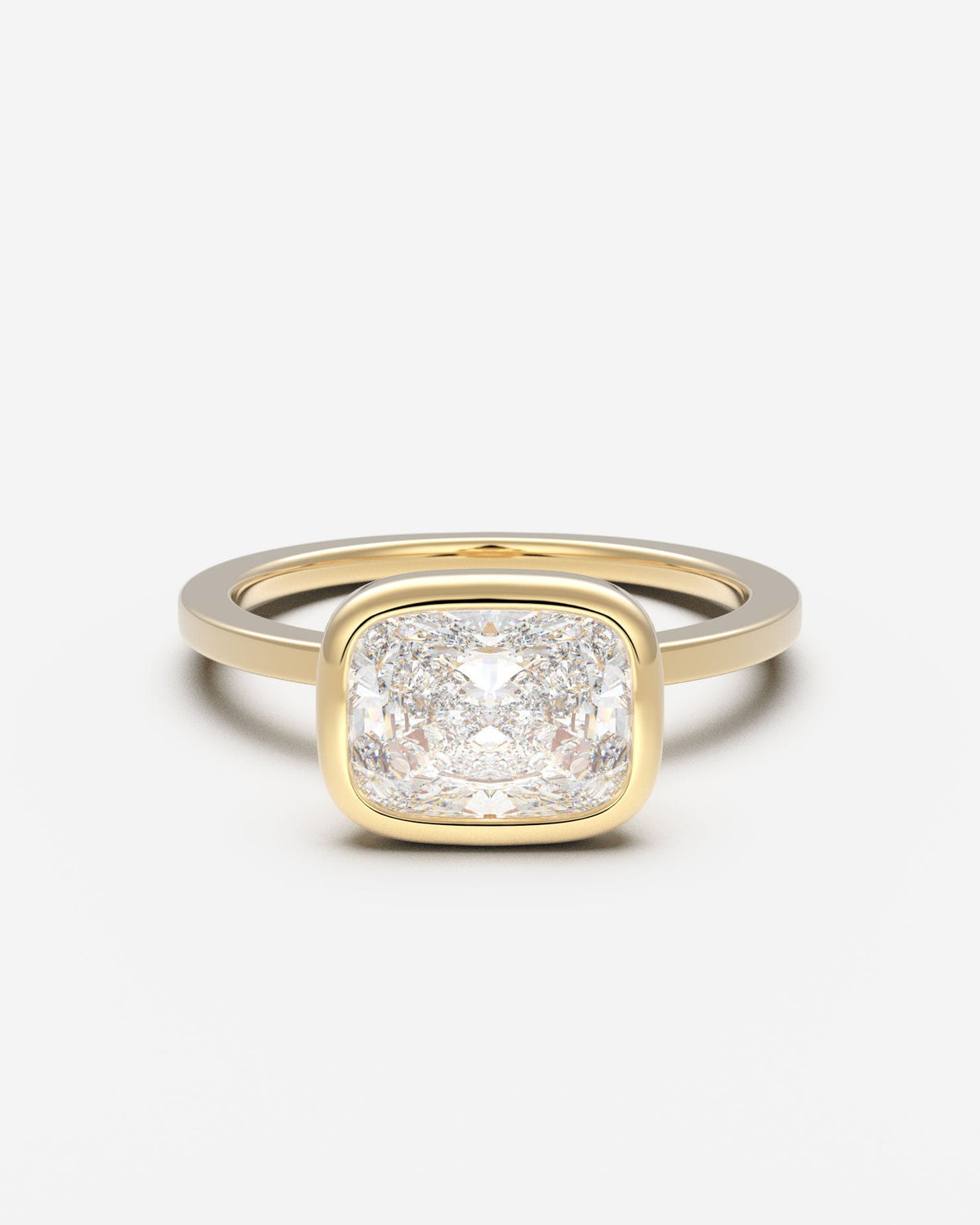 The East West Bezel Solitaire — Elongated Cushion