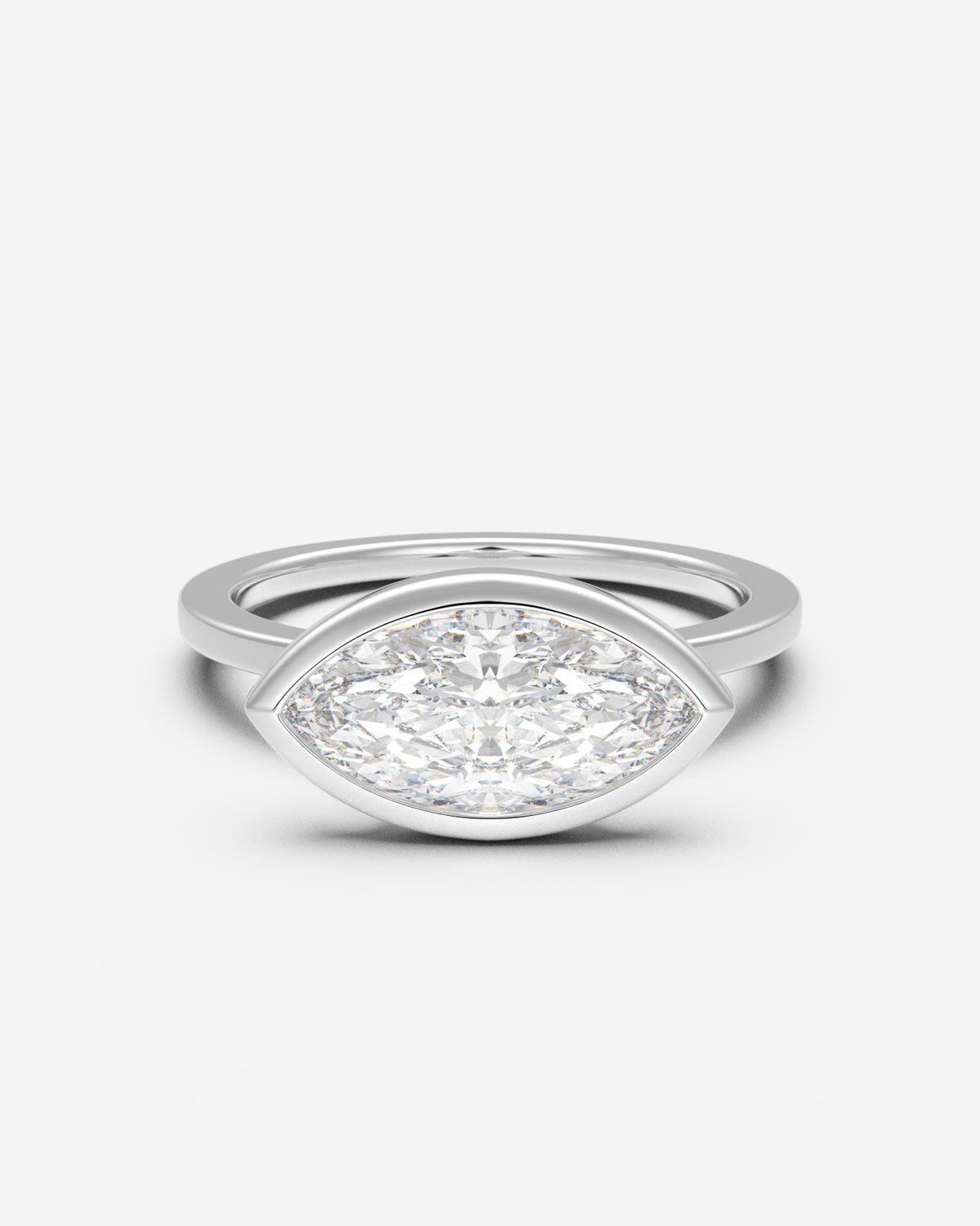The East West Bezel Solitaire — Marquise