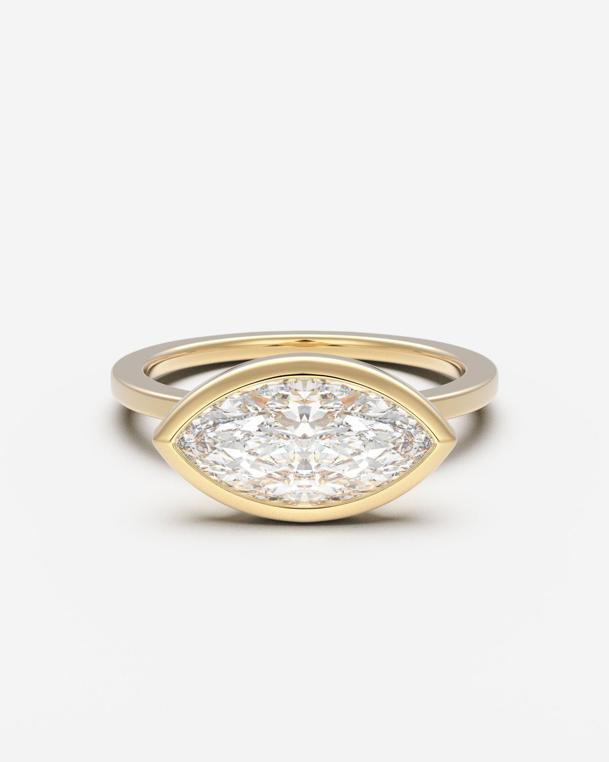 The East West Bezel Solitaire — Marquise