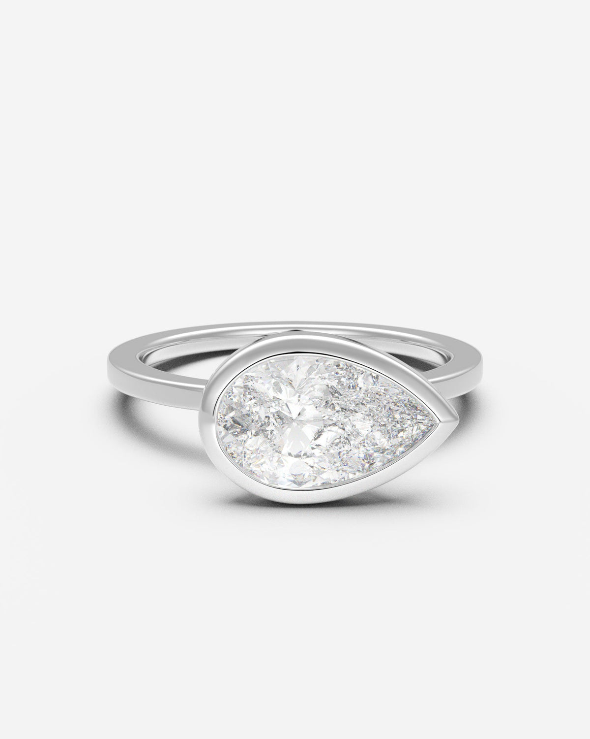 The East West Bezel Solitaire — Pear