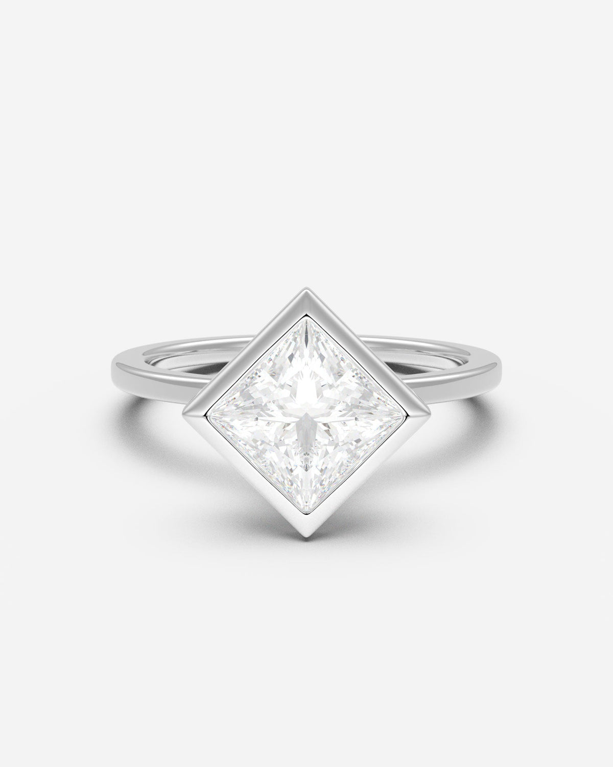 The East West Bezel Solitaire — Princess