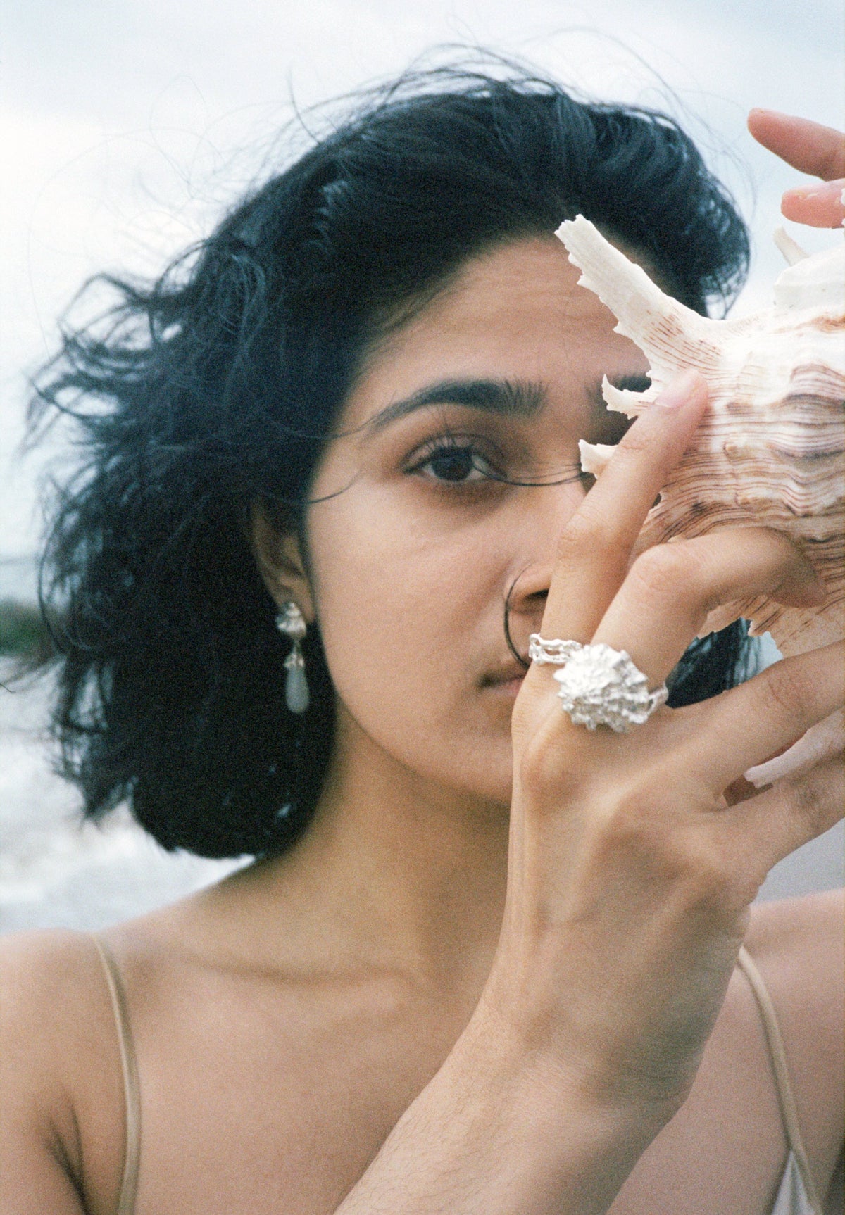 Unearthed- Sea whisper moonstone earrings with a broken seashell