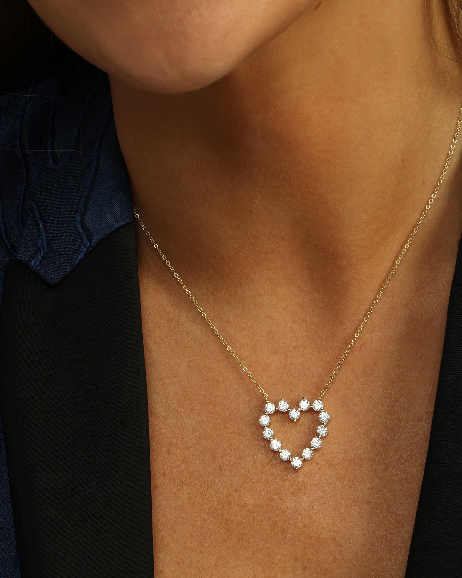 she-is-an-icon-baby-heart-necklace-in-gold-and-white-diamondettes