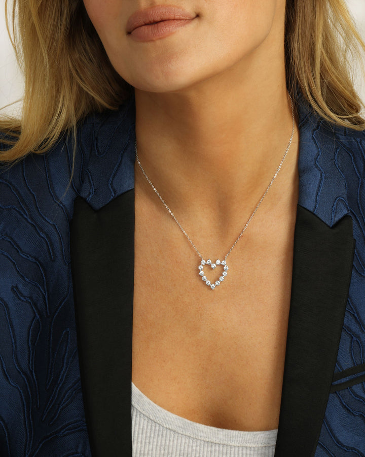 she-is-an-icon-baby-heart-necklace-in-silver-and-white-diamondettes