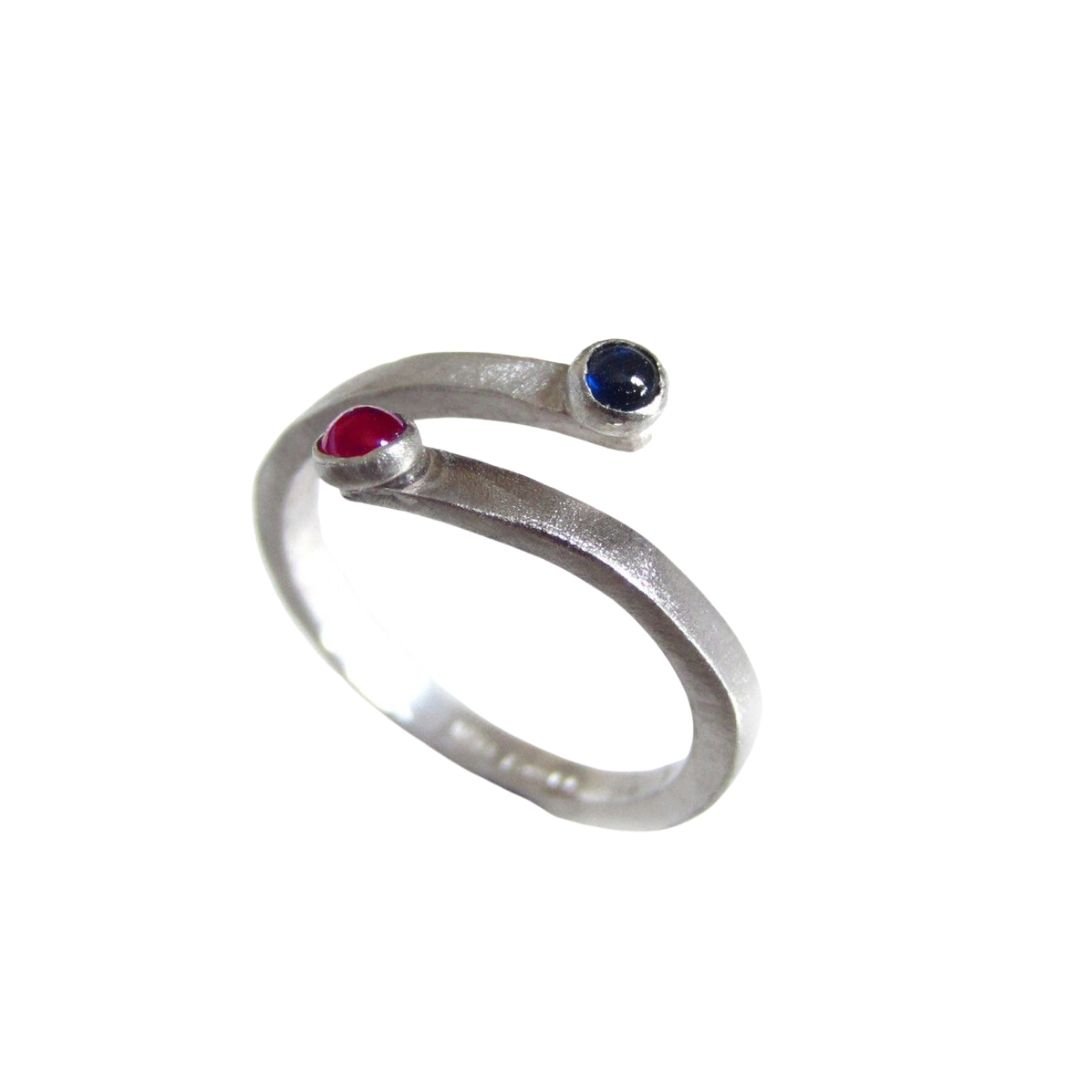 sapphire-and-ruby-you-and-me-crossover-silver-ring