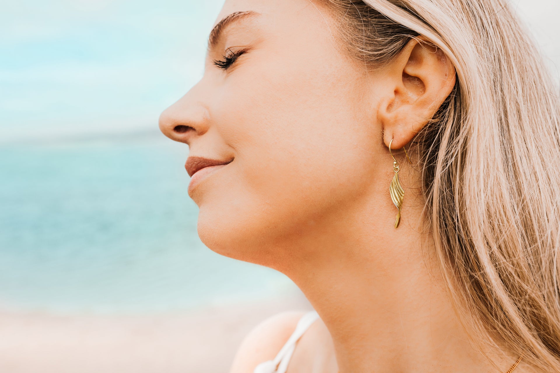 Curved Gold Shell Drop Earrings