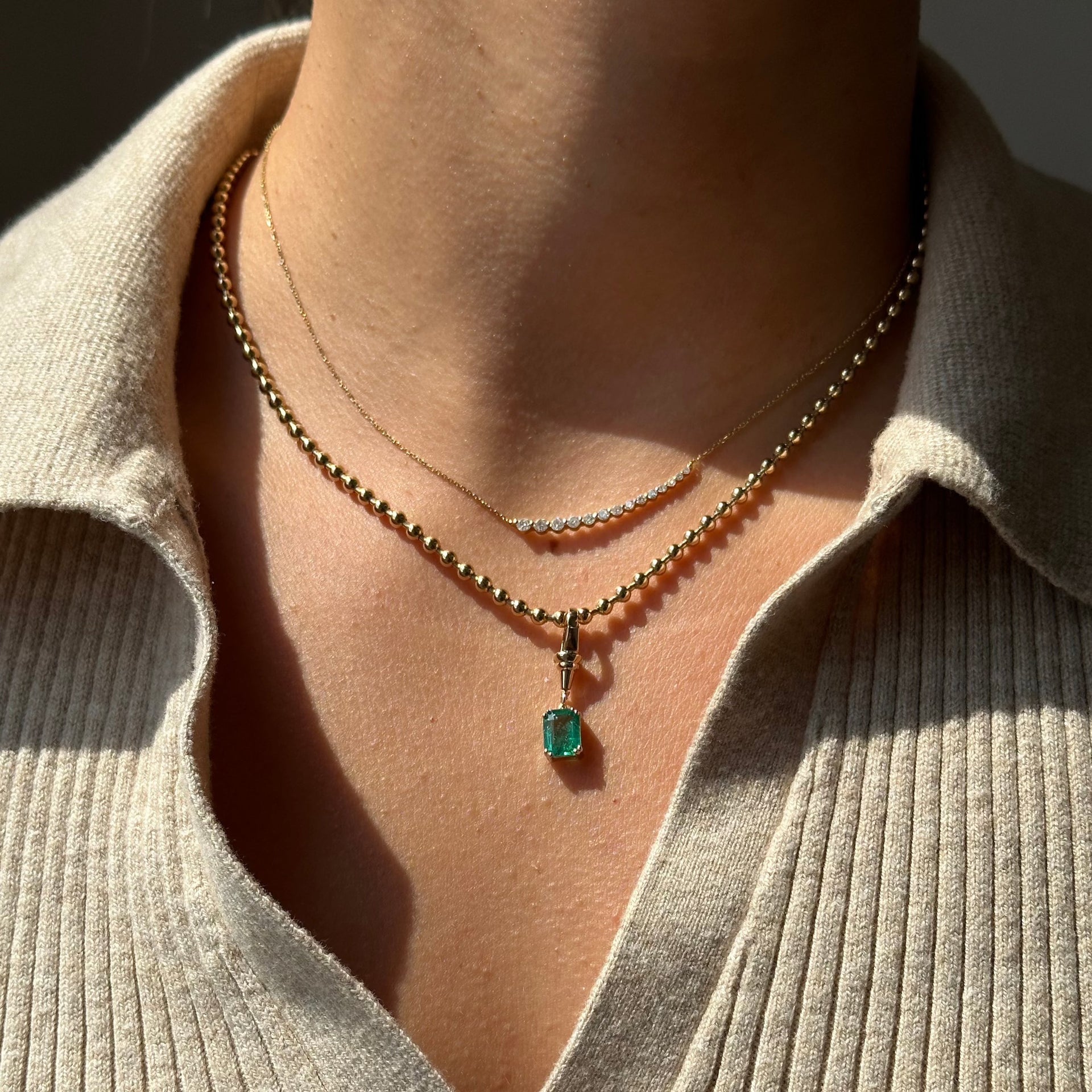 Gold Emerald Baguette Clasp Pendant