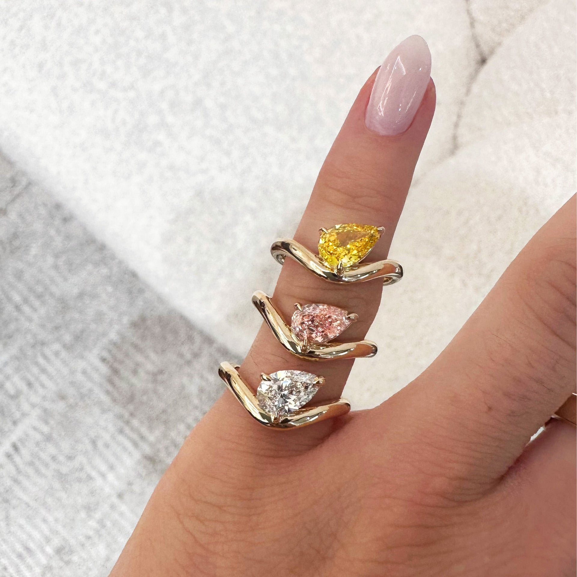 Curved Pear Diamond Pinky Ring