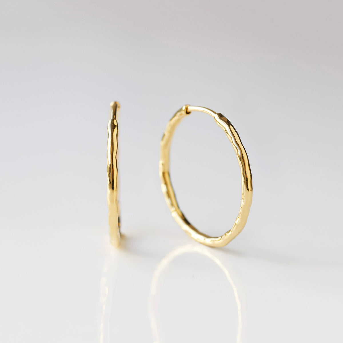 Molten Infinity Hoop Earrings