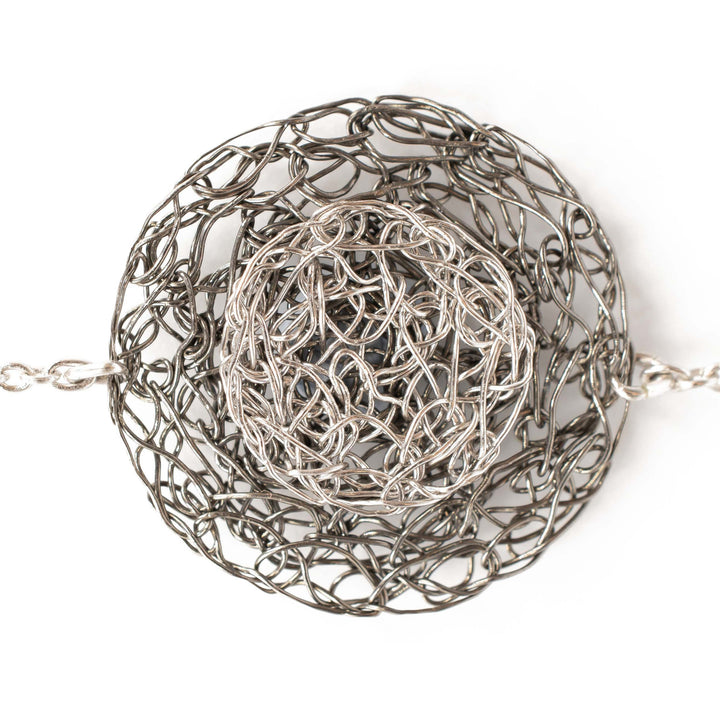 black-rhodium-and-platinum-disc-bracelet