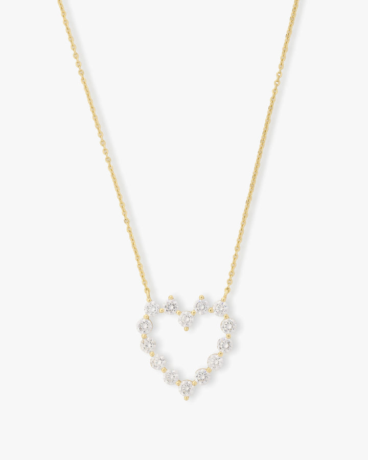 she-is-an-icon-baby-heart-necklace-in-gold-and-white-diamondettes