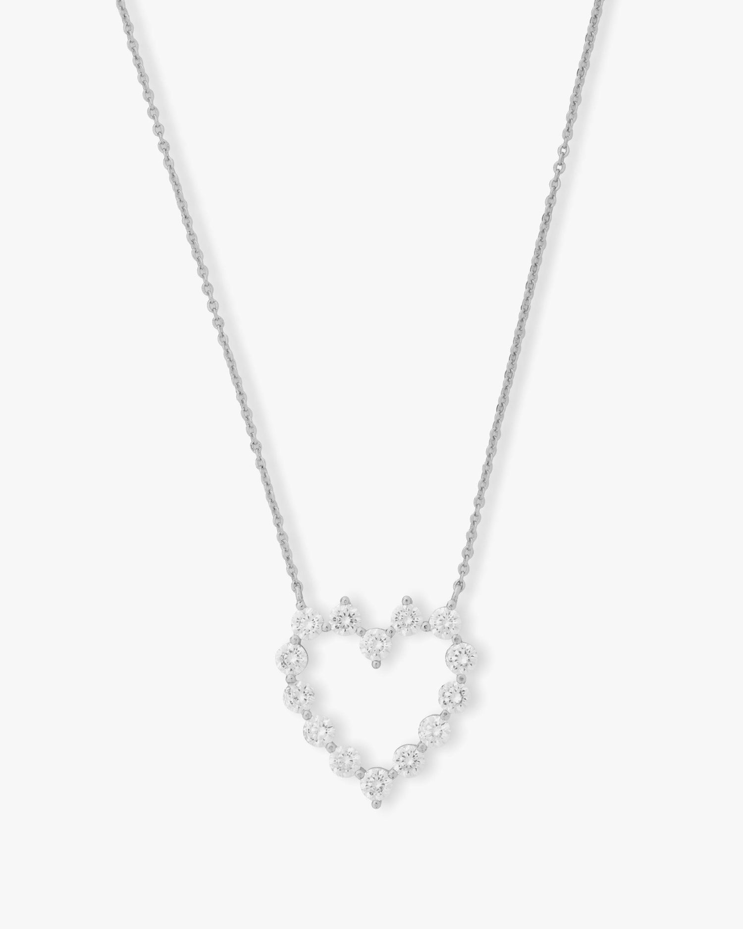 she-is-an-icon-baby-heart-necklace-in-silver-and-white-diamondettes