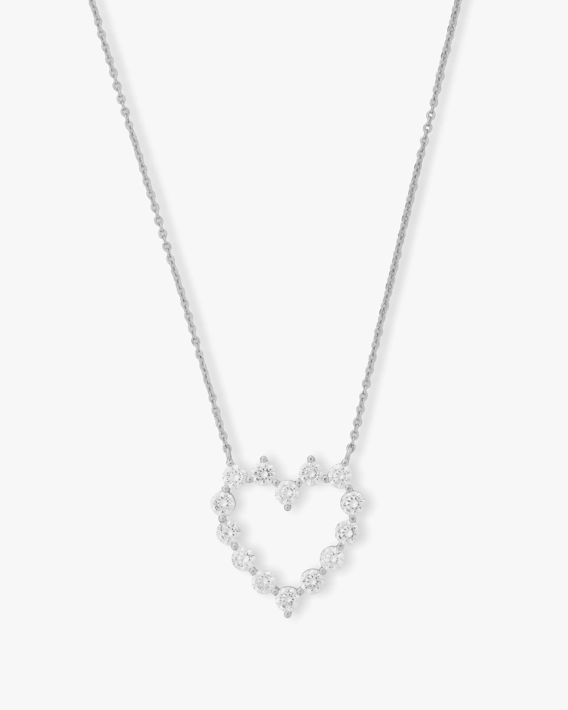 she-is-an-icon-baby-heart-necklace-in-silver-and-white-diamondettes