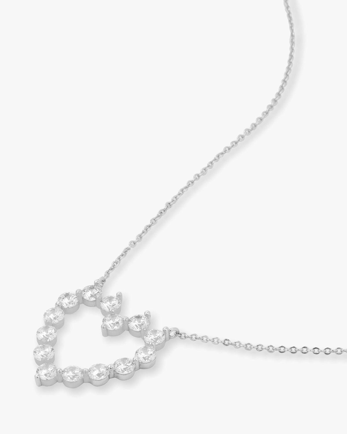 she-is-an-icon-baby-heart-necklace-in-silver-and-white-diamondettes