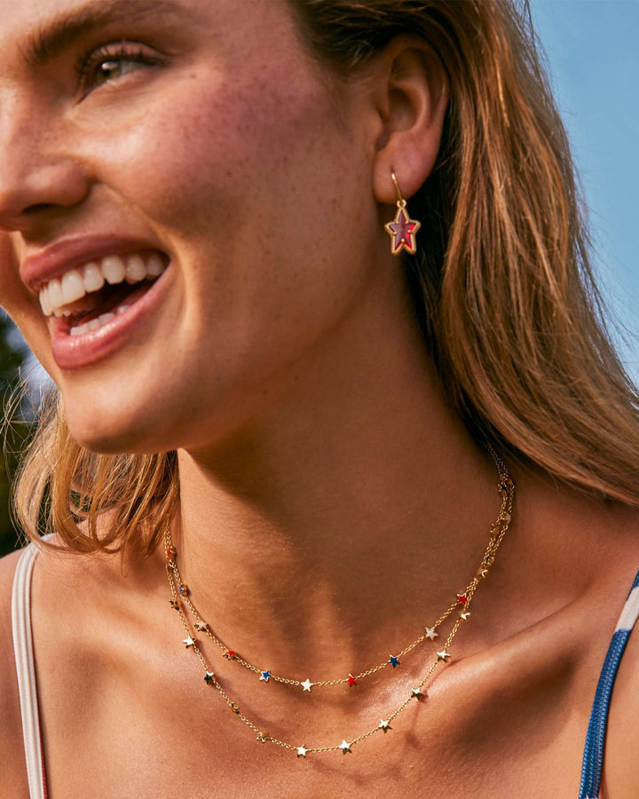 ada-gold-star-small-drop-earrings-in-red-illusion-swarovski