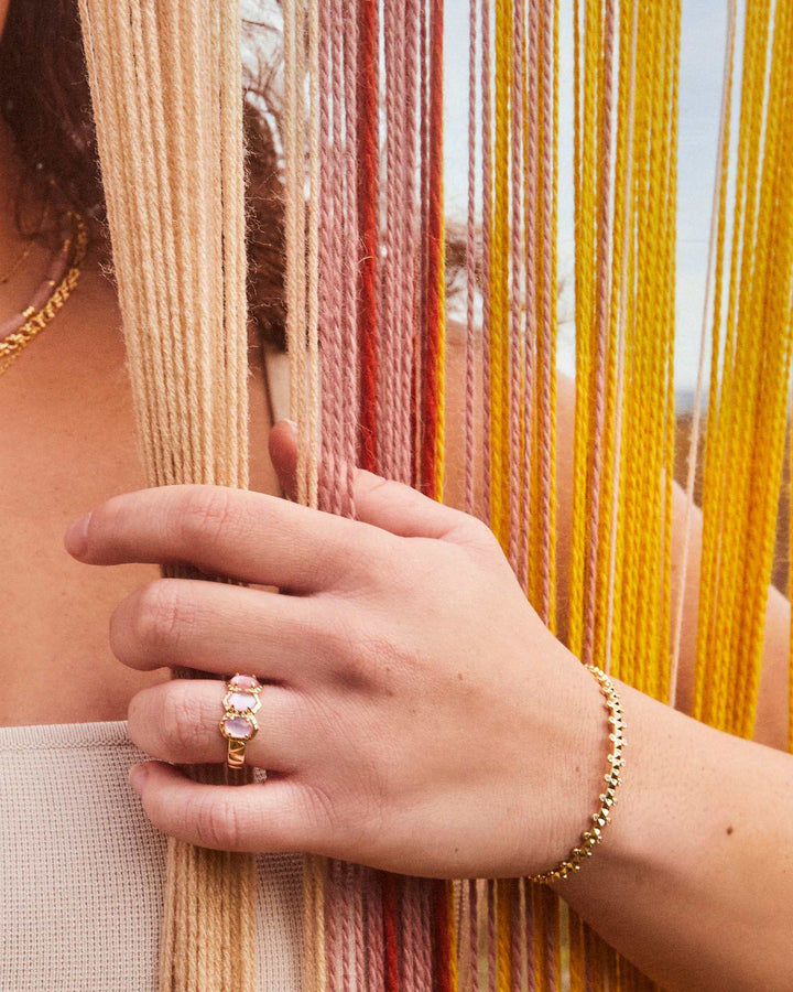 daphne-gold-band-ring-in-light-pink-iridescent-swarovski