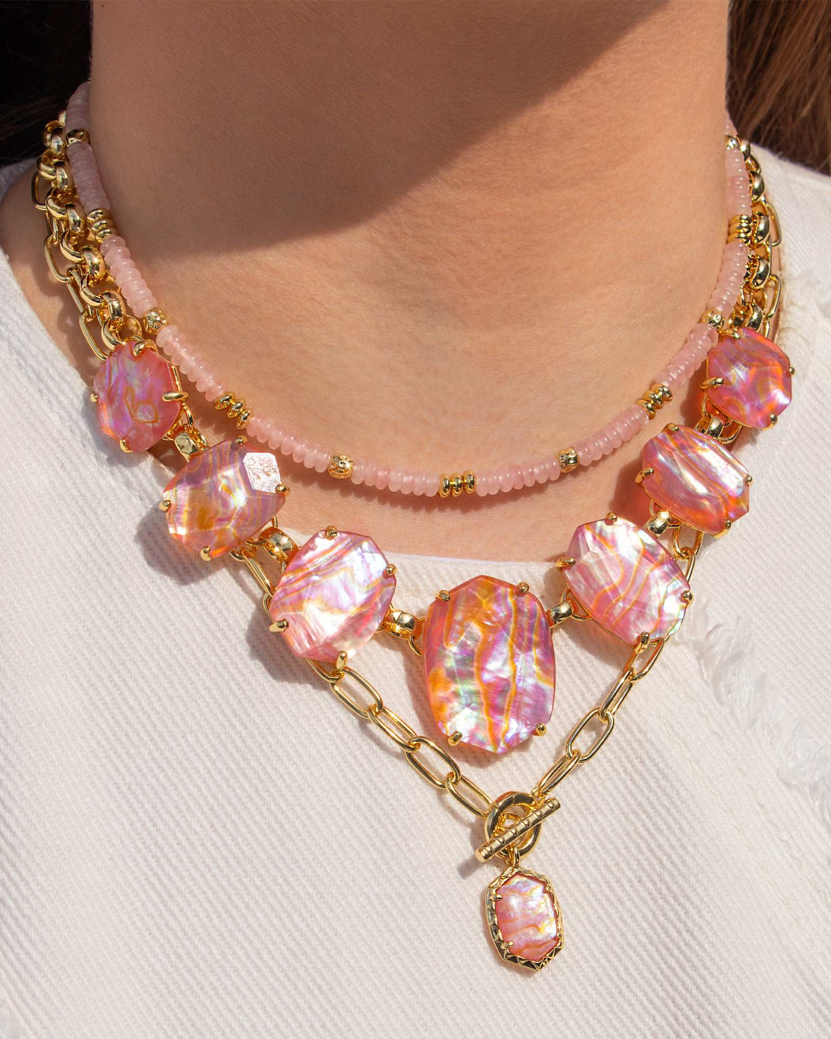 daphne-convertible-gold-link-and-chain-necklace-in-light-pink-iridescent-abalone-swarovski