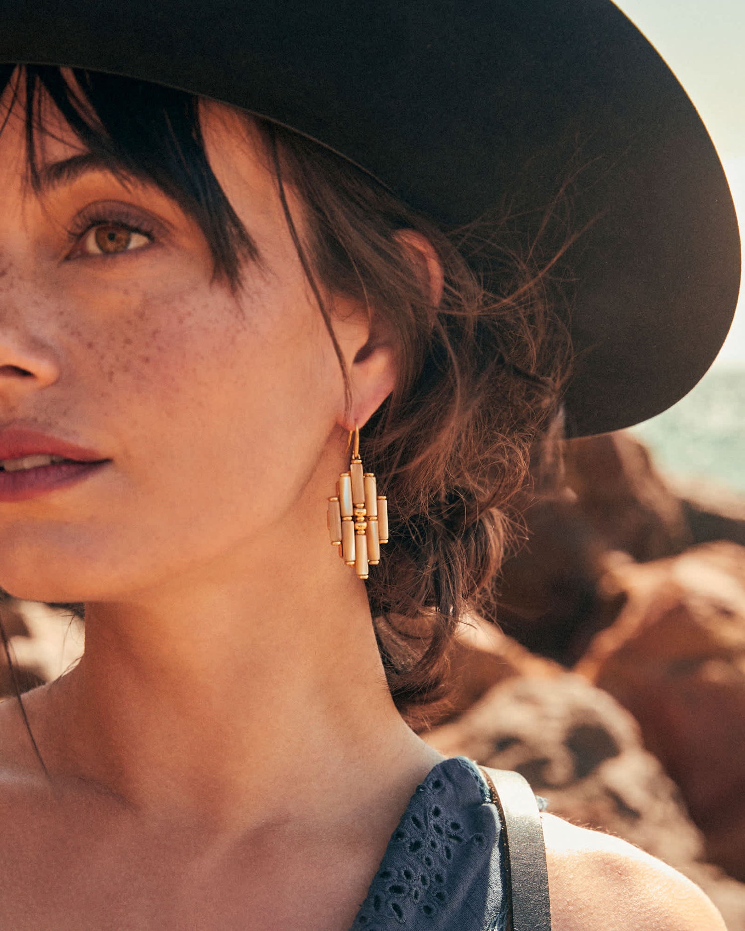 ember-gold-drop-earrings-in-bronze-veined-turquoise-magnesite-red-oyster-swarovski