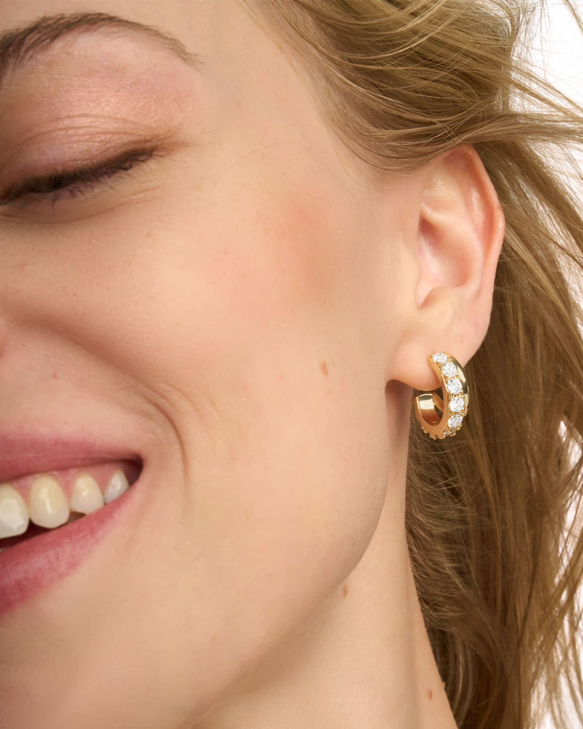 livy-gold-huggie-earrings-in-white-crystal-swarovski