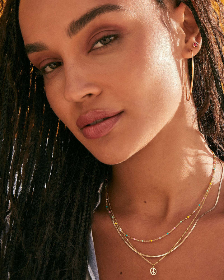 mini-peace-sign-pendant-necklace-in-18k-gold-vermeil-swarovski