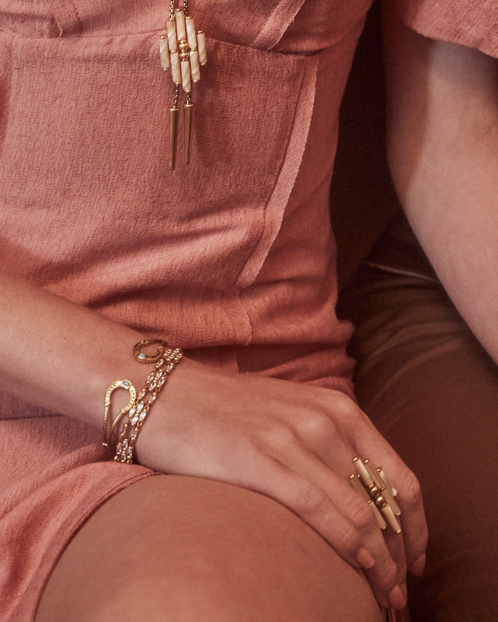 noble-vintage-gold-horseshoe-cuff-bracelet-in-variegated-dark-teal-magnesite-swarovski