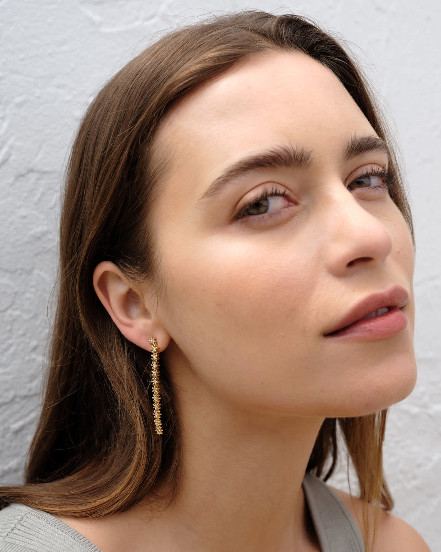 nydia-gold-linear-earrings-in-white-swarovski