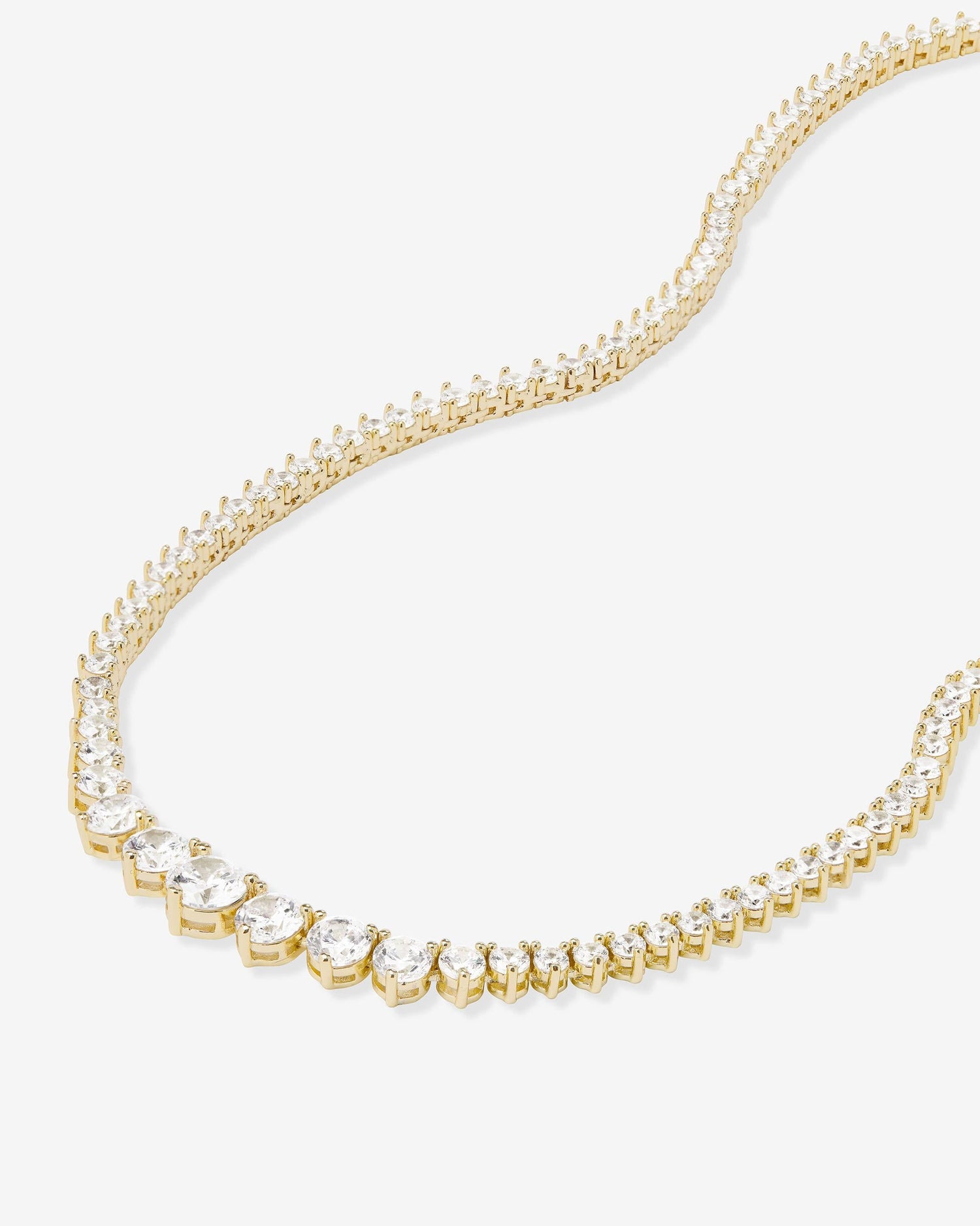 not-your-basic-graduated-tennis-necklace-18-inch-in-gold-and-white-diamondettes
