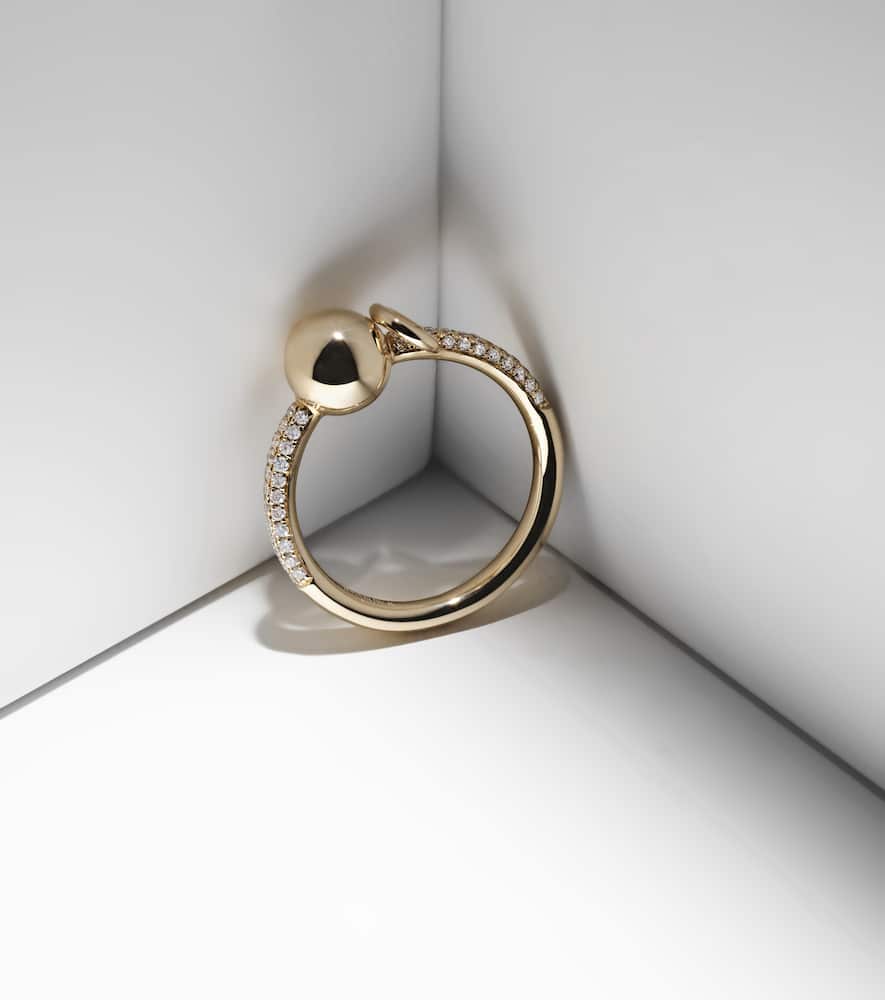 Piercing 14kt gold ring with diamonds
