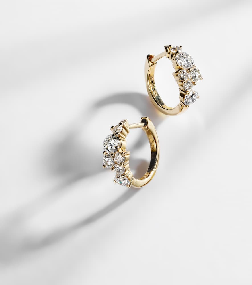 Huggie 14kt gold earrings with diamonds