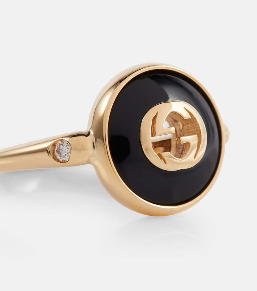 Interlocking G 18kt gold ring with onyx and white diamonds