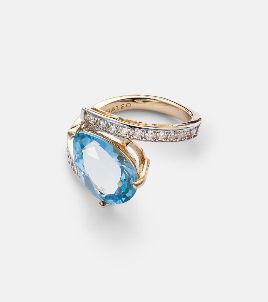 Slanted 14kt gold ring with topaz and diamonds