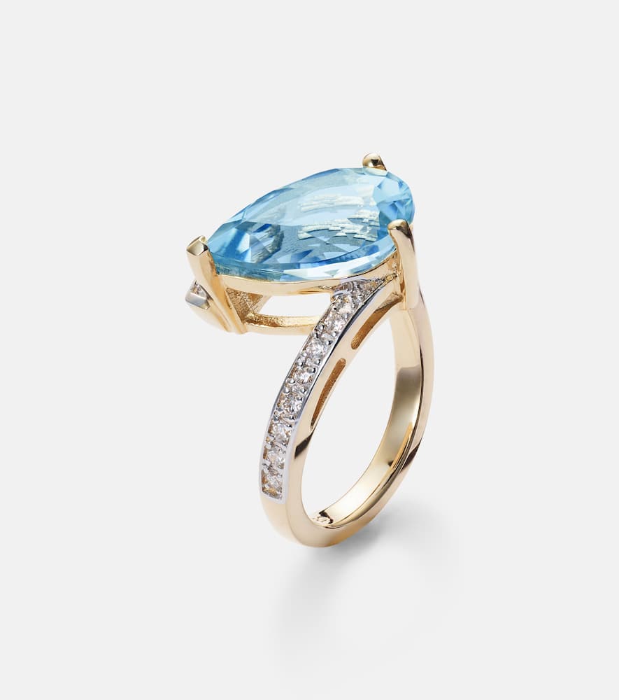 Slanted 14kt gold ring with topaz and diamonds