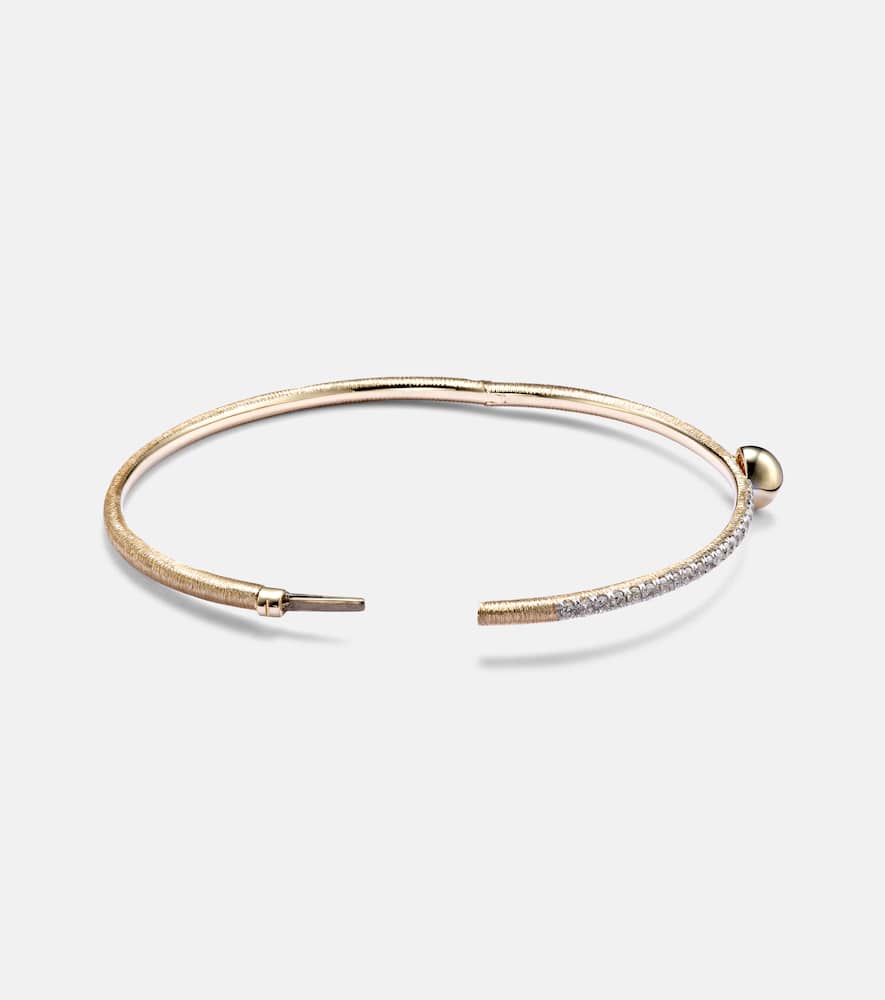 Ball 14kt gold bangle with diamonds