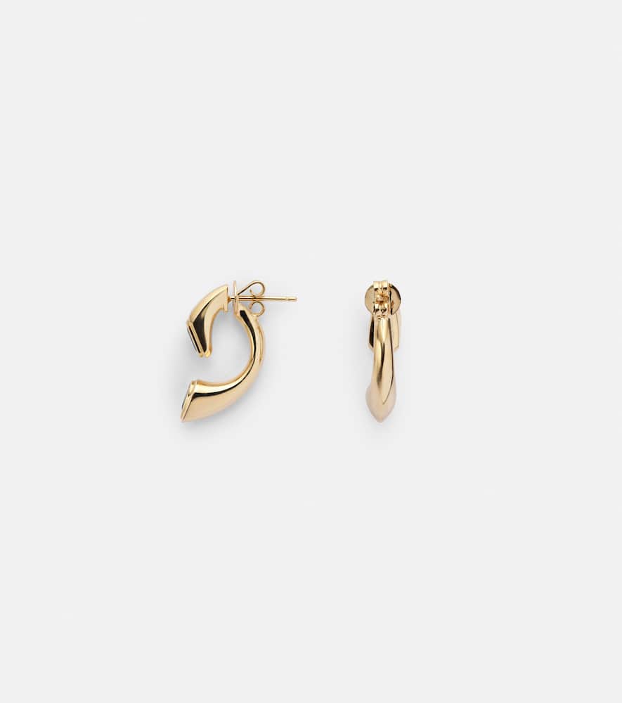 Bypass 18kt gold earrings with emeralds