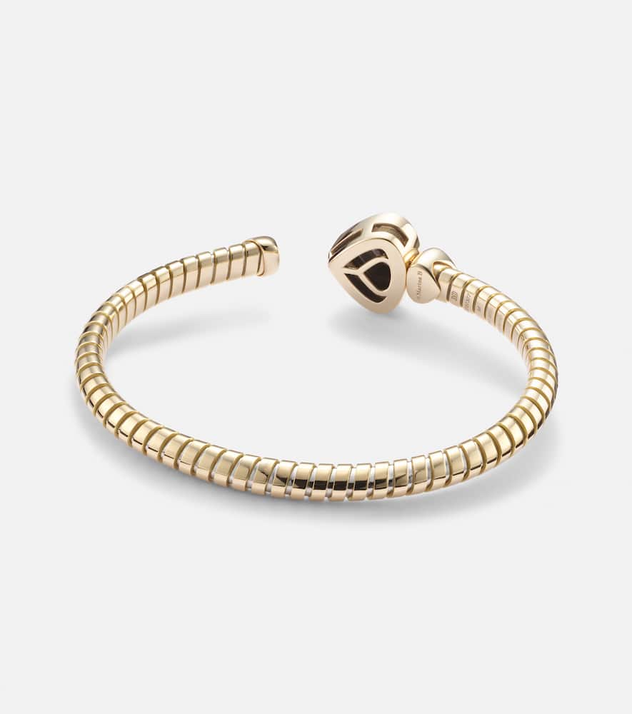 Trisolina Bypass 18kt gold bracelet with topaz and diamonds