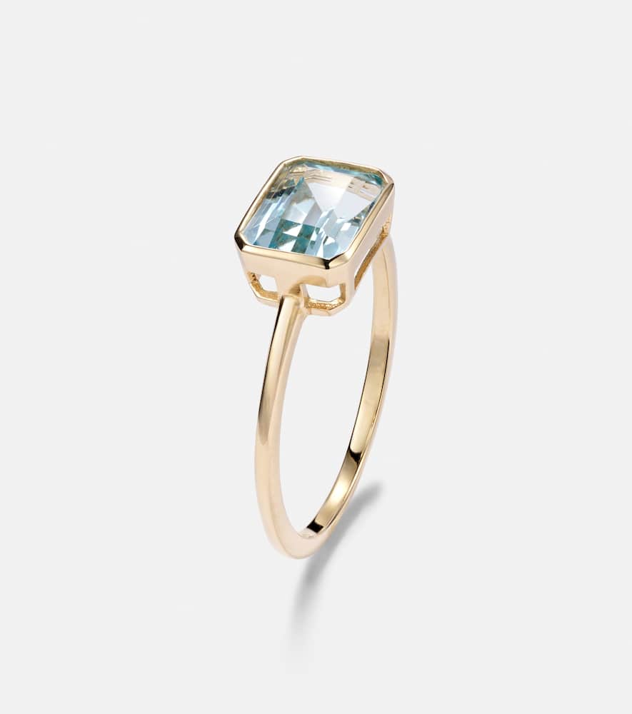 14kt gold ring with blue topaz