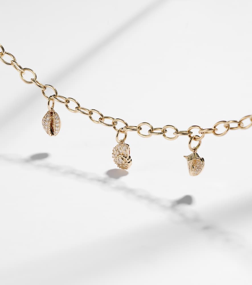 14kt gold charm bracelet with diamonds