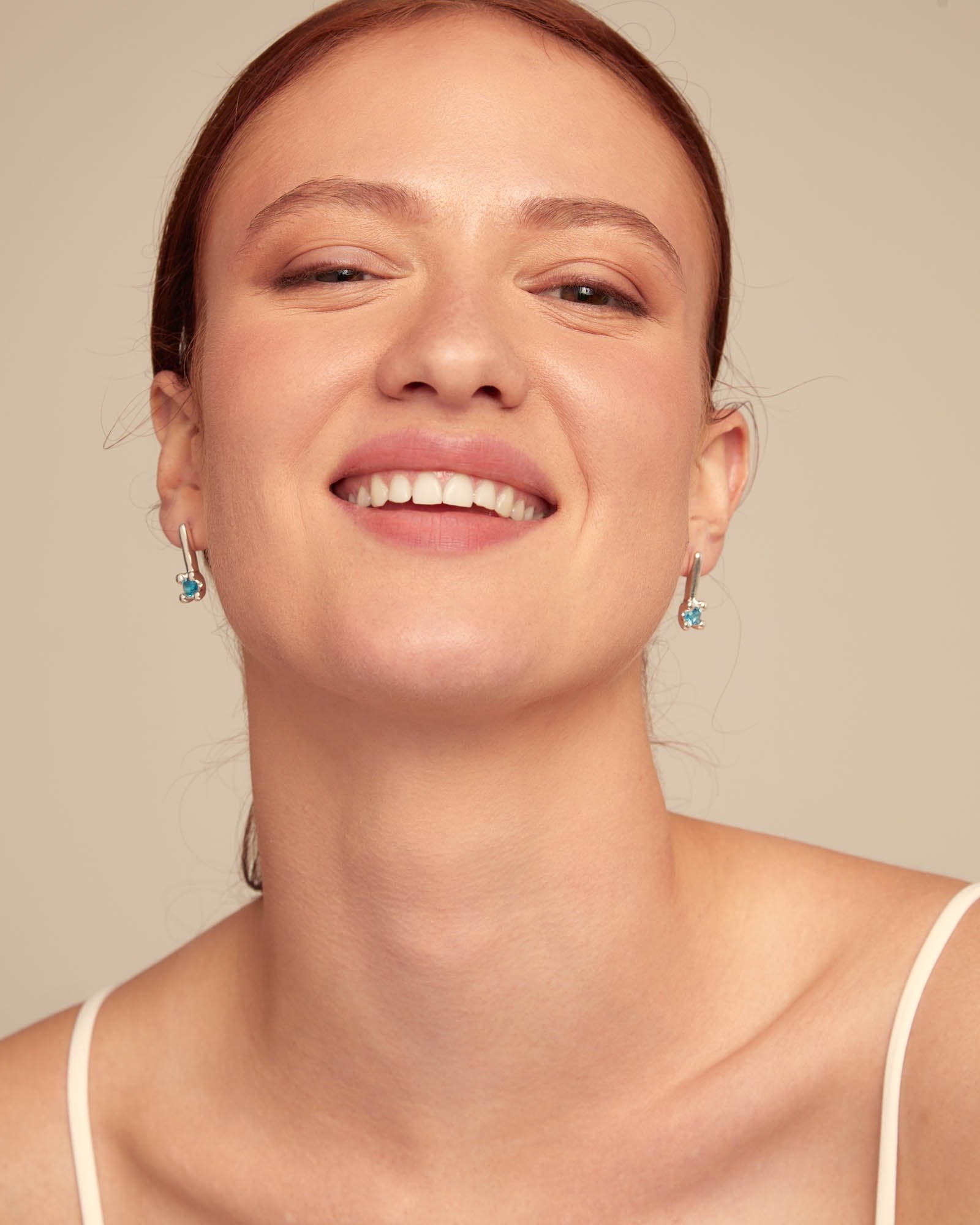 Drop earrings with blue cubic zirconia